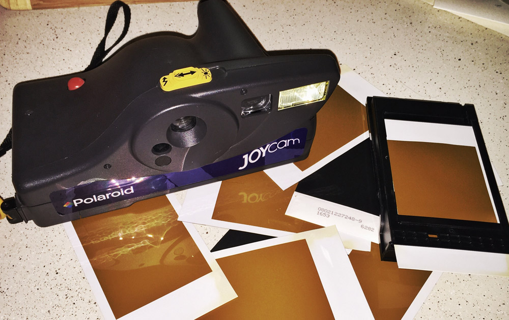 Polaroid JoyCam and 500 film